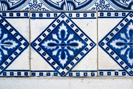Closeup of blue over white Portuguese glazed tiles.の写真素材