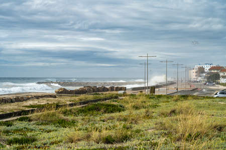 OVAR, PORTUGAL - 18 MAY 2022: The sea climbs the Furadouro beachfront in Ovar. Advancement of the...