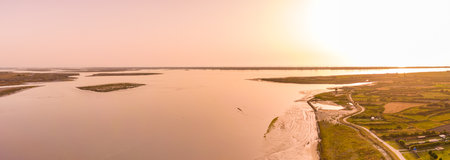Aerial View of Aveiro Lagoon at sunset, view from Bico's beach in Murtosa, Aveiro, Portugal.の写真素材