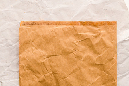 Abstract texture of striped paper of two brown tones for empty and pure backgrounds.