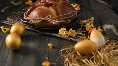 Easter folar with egg on wooden table top.の写真素材