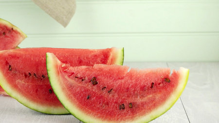Watermelon slices on wooden vintage background.の写真素材