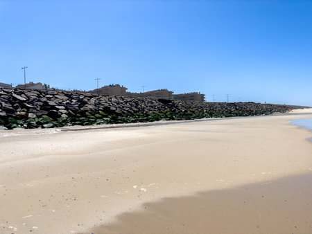 OVAR, PORTUGAL - AUGUST 5: Low tide reveals what's left of the sand on beach on the south beach of Furadouro in Ovar.のeditorial素材