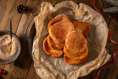 Traditional Portuguese Christmas Rabanadas. Spanish Torrijas on kitchen countertop.の写真素材