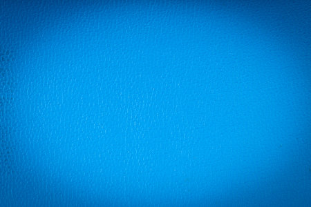 Blue leather texture closeup detailed background.の写真素材