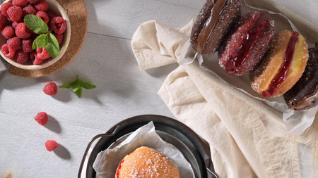 Bolas de Berlim, or Berlin Balls. Portuguese fried dough with sugar, Filled with sweet cream.