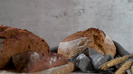 Artisan bread loaves on a rustic table, a warm bakery scene.
