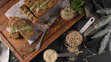 Christmas lentils loaf on dark kitchen countertop.の写真素材