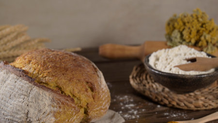 Homemade crispy turmeric bread, on a kitchen countertop.の写真素材