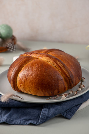 A beautifully baked Folar da PÃ¡scoa, a traditional Portuguese Easter cake, ready to be shared...