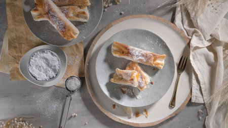 Typical portuguese sweets Pasteis de Vouzela served on countertop.