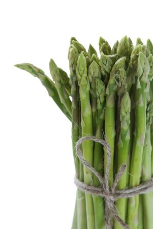 Bundle of green asparagus isolated on a whiteの写真素材