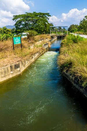ChiangMai, Thailand. January, 19-2017: Irrigational canal situated in rural area due to water reservation for agricultural purposes.の写真素材