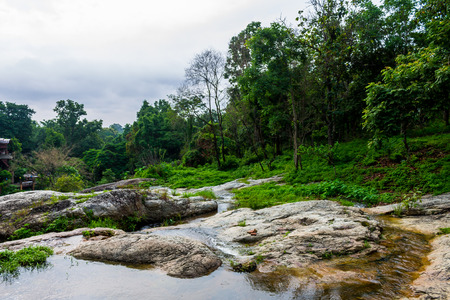 ChiangMai, Thailand. October, 07-2016: Huay Kaew water fall flows down from top of the Suthep mountain.の写真素材