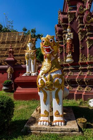 ChiangMai, Thailand. December, 02-2017: The imaginary art of angel and animal located on the wall of Buddhist temple symbolise to protection.のeditorial素材