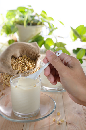 Soy pudding with nice table top settingの写真素材