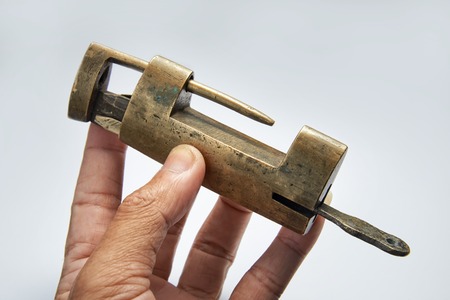 Old style lock on clean backgroundの写真素材