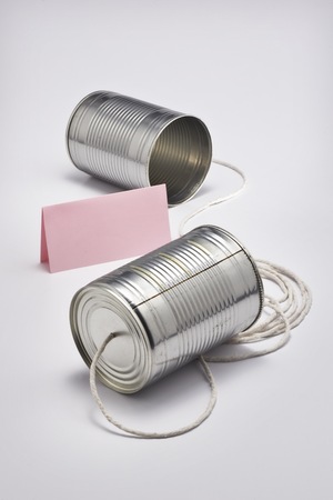 Vintage tin can telephone systemの写真素材