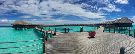 Water Bungalows on the tropical lagoon in Maldives - travel backgroundのeditorial素材