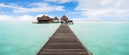 Water Bungalows on the tropical lagoon in Maldives - travel backgroundのeditorial素材