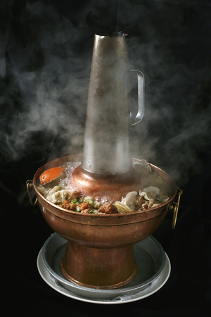 Hot pot of fresh beef and crab in Beijing styleの写真素材
