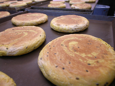 Curry Bread with sesame on fry pan