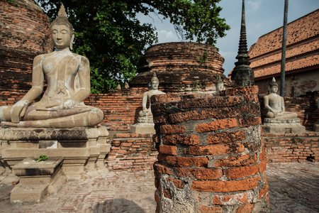 Statue of an old priest in a temple in Ayutthaya.の写真素材