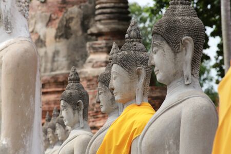 Ancient Buddhist statues of Thailand in Ayutthayaの写真素材