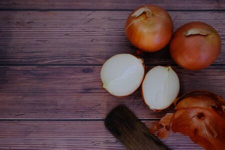 Onions on wooden floorsの写真素材