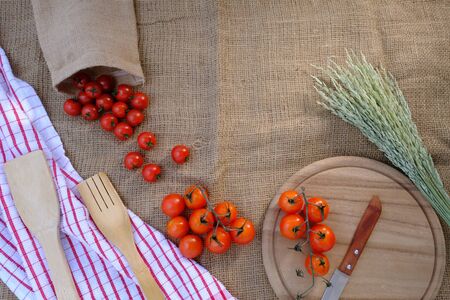 Tomatoes on the sack in the kitchenの写真素材