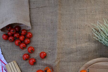 Tomatoes on the sack in the kitchenの写真素材