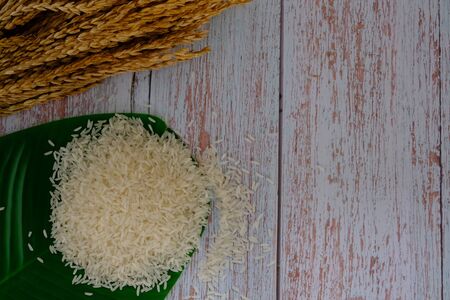 Rice on the wood flooring in the kitchenの写真素材