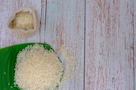 Rice on the wood flooring in the kitchenの写真素材
