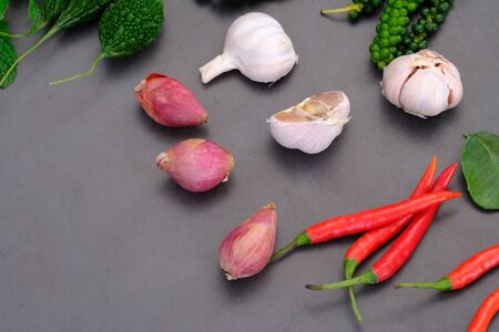 Chili, onion, garlic and spices in the kitchenの写真素材