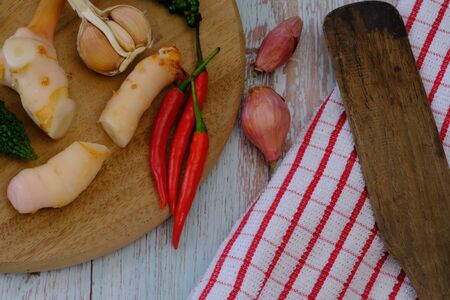 Chili, onion, garlic and spices in the kitchenの写真素材