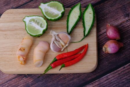 Peppers, onions, garlic and spices in the kitchenの写真素材