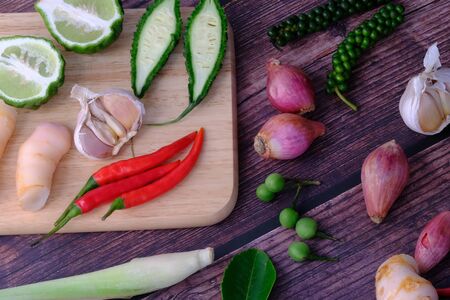 Peppers, onions, garlic and spices in the kitchenの写真素材