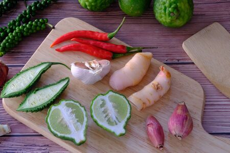 Peppers, onions, garlic and spices in the kitchenの写真素材