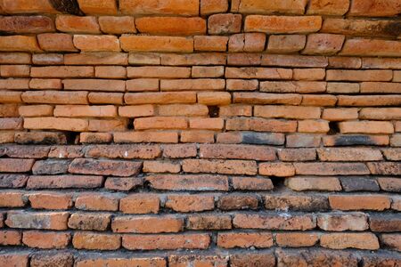 The old wall on the road in Ayutthaya.