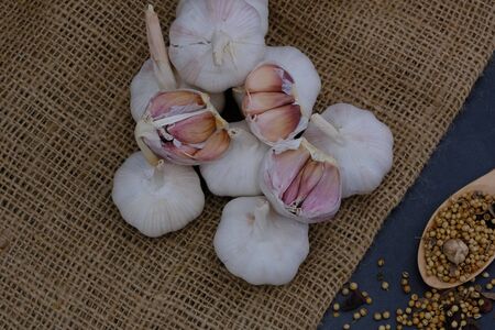White garlic in the kitchen for cookingの写真素材