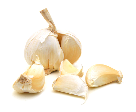 garlic isolated on white backgroundの写真素材