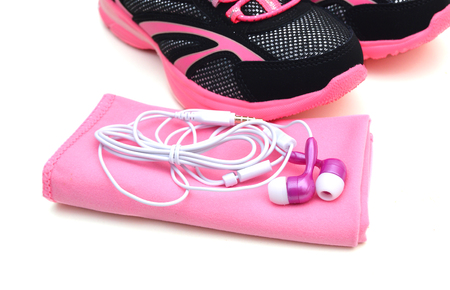 Black and pink sport shoes on white backgroundの写真素材