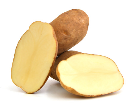 Potatoe and slice isolated on a white backgroundの写真素材