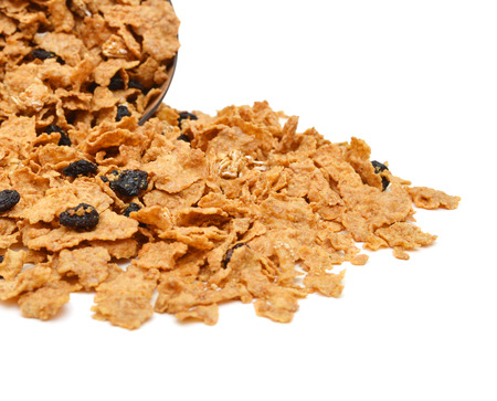 bran and raisin cereal in a wood bowlの写真素材