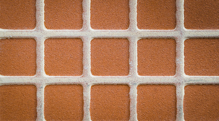 Close up brown square mosaic tile, pattern and backgroundの写真素材