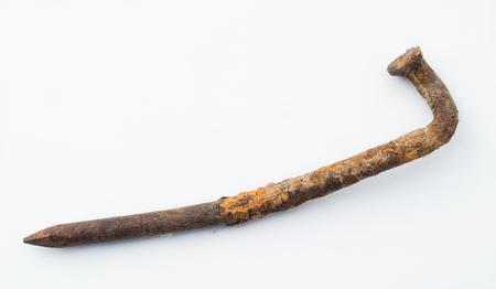 Rusty nail isolated on white backgroundの写真素材