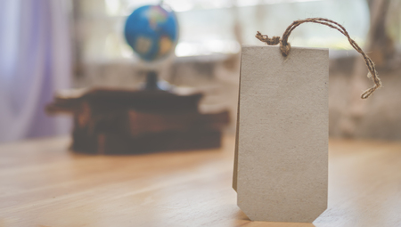Brown paper tag on wooden table