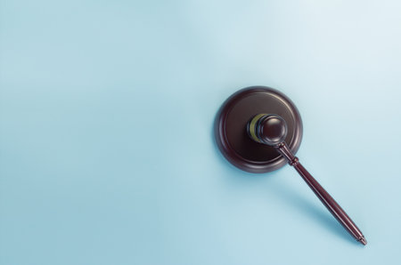 Gavel on blue background view from the top with  space for text, legislation symbolの写真素材