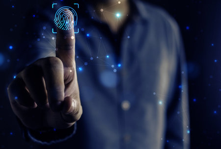a man touching a finger on a virtual scanner, personal data , thumbprint, holographic interface,...