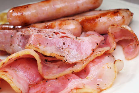 Cooked bacon and sausageの写真素材
